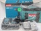 Makita assortment - 11 volt charger, 2 batteries, tool bag (no tool)