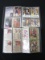 TWO SMALL SPORTS CARD BINDERS W/ CARDS