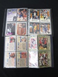 TWO SMALL SPORTS CARD BINDERS W/ CARDS