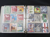 BINDER OF FOOTBALL BASEBALL BASKETBALL CARDS