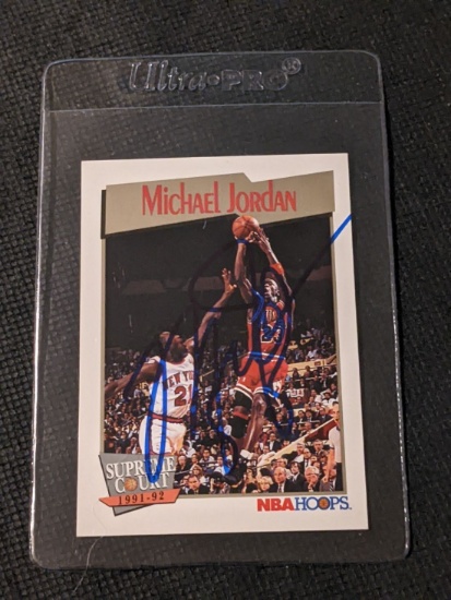 Michael Jordan Autograph with COA on a 1991 NBA hoops card