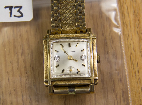 Bulova 1950's classic wristwatch. Runs. Gold fill, brassing on back of case