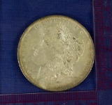 4 COINS: 1885-O Morgan Dollars
