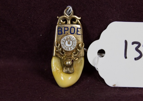 BPOE Elk Tooth Not marked, but appears to be gold. Ruby set eyes