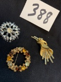 three vintage Mid Century Brooch pins costume jewelry Karu Arke Inc. and others
