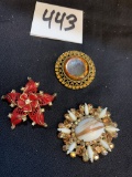 group of Three mid century Art Deco brooch's