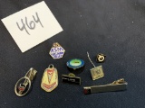group of Saginaw Steering Gear Pontiac Dephi award pins and tie clips