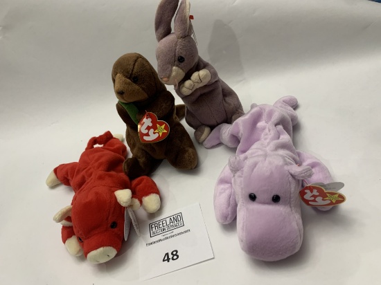 Four Beanie Babies Happy, Springy, Snort, And Seaweed