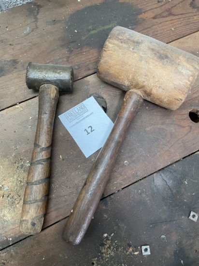 Two antique mallets, one brass and one wooden