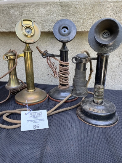 Three Candlestick telephones