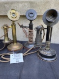 Three Candlestick telephones