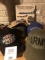 Military hats and book