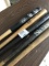 Five vintage Louisville Slugger baseball bats