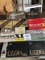 Several dozen brand new golf balls in packages