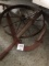 Cast iron antique wheel and farm tool