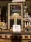 Group of home décor wooden art and other items.