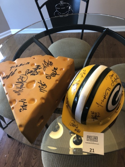 Green Bay Packers autographed cheese and helmet