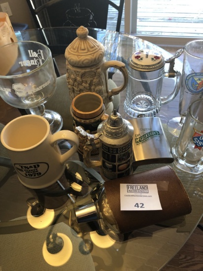 Whiskey flasks and beer stiens