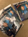 Three new in packages rain suits