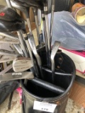 Group of golf clubs PING and others in golf bag