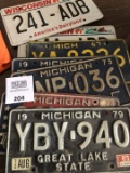 Group of several Michigan Wisconsin License Plates