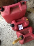 Four vintage style gas cans