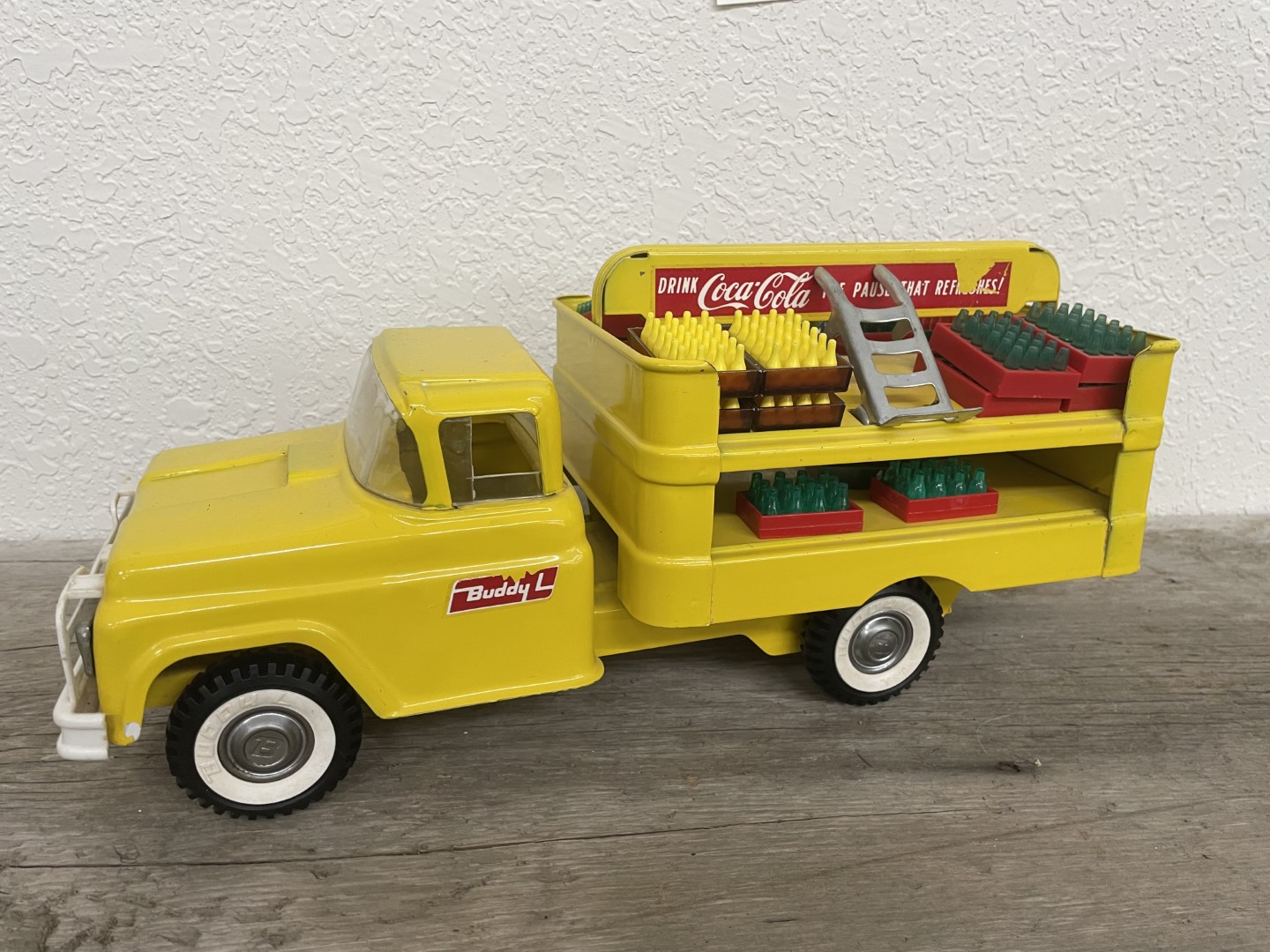 1960s Buddy L yellow Coca-Cola truck with | Proxibid