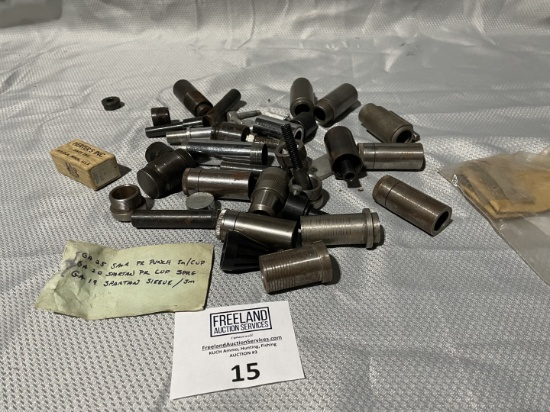 Group of reload dies punches and sleeves