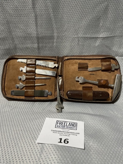 unusual group of small tools in leather pouch