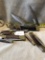 Ten Wood and Brass Handle Knives