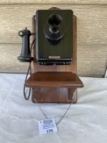 1920s Kellogg metal wall telephone mounted on wooden backboard