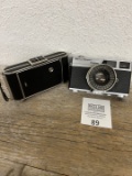 Pair of vintage cameras Bell & Howell Canon and other