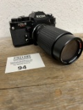 Ricoh Super KR-5 vintage camera with long lense