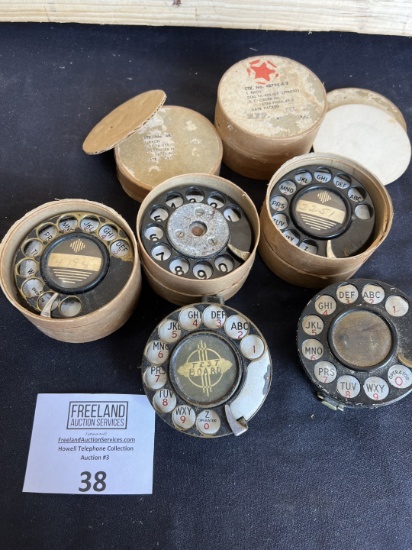 Group of several telephone dials including AE cutout fingerwheel