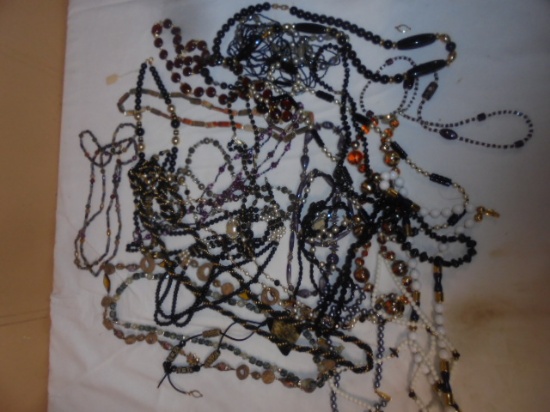 Large Group of Ladies Black and Earthtoned Jewelry