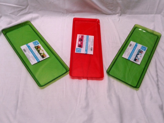 Three plastic Trendware Serving Trays