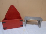 Red Wooden Hanging Box and Small Gray Wooden Bench