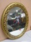 Oval Gold Framed Wall Mirror