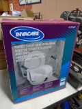 Invacare  Raised Toilet Seat w/ Arms