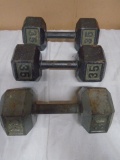 (2) 35lb Iron Dumbells & (1) 30lb Iron Dumbell