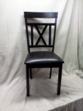 Black padded seat wood frame chair