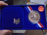 1986 Elles Island Proof Silver Dollar