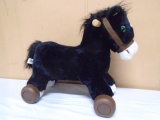 Child's Rolling Ride-On Horse