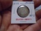 1877 Seated Liberty Quarter
