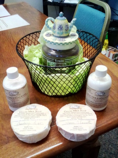 Metal Wire Basket containing Yankee Candle, Goat Milk Soap & Lotion and More