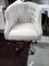 Oatmeal Color Tufted Swivel Adjustable Height Accent Chair