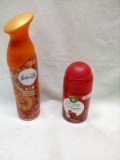 Two Cans of Air Freshner 1 Febreeze Pumkin Spice and 1 Air Wick Apple Cinn