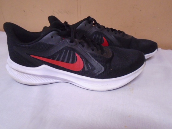 Pair of Men's Nike Downshifter Shoes