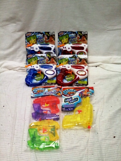 Qty. 6 Packs of Water Squirt Guns as seen in pics