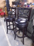 2 Matching Padded Leather Seat Swivel Stools